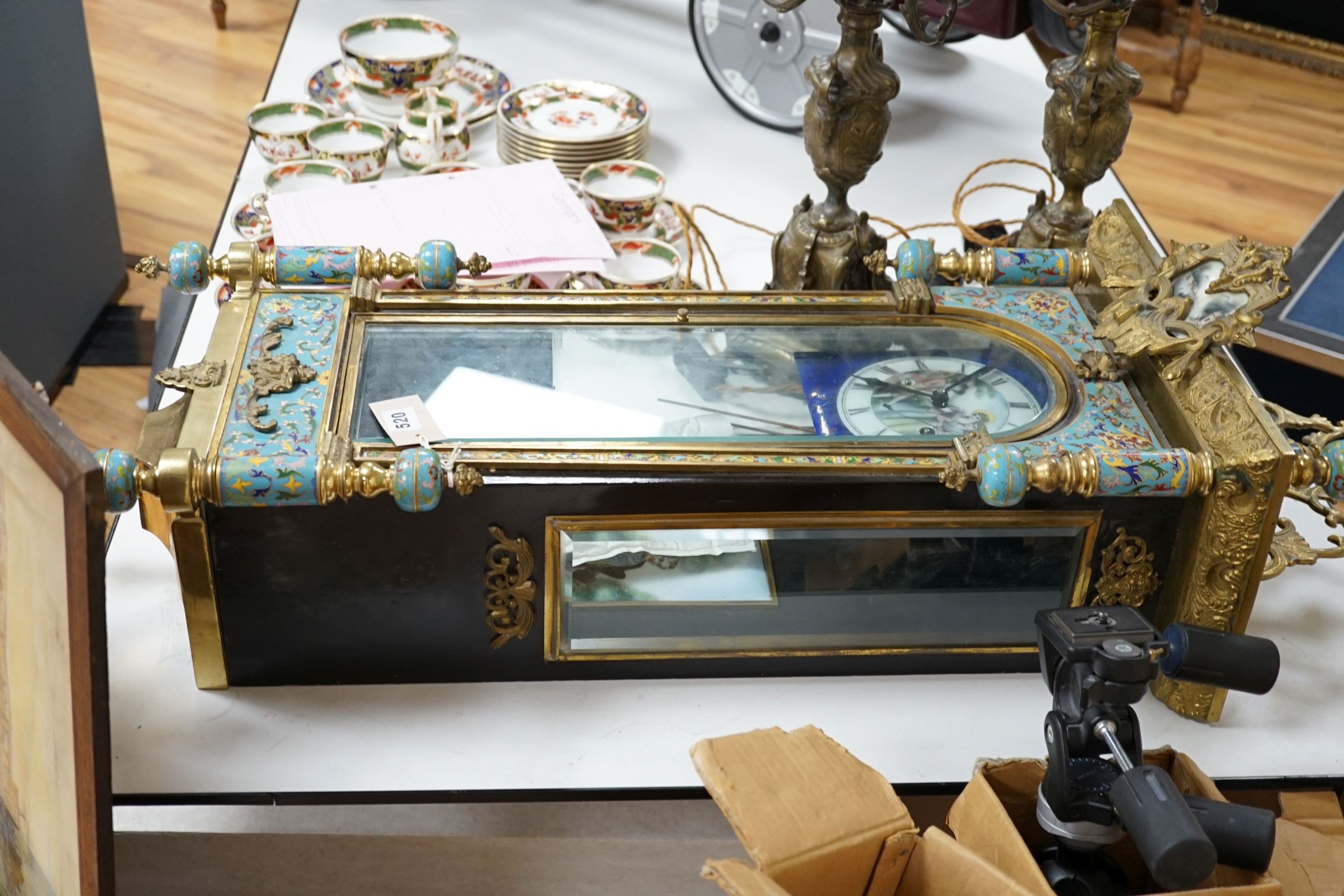 A Chinese cloisonné enamel and gilt metal wall clock, 107cm